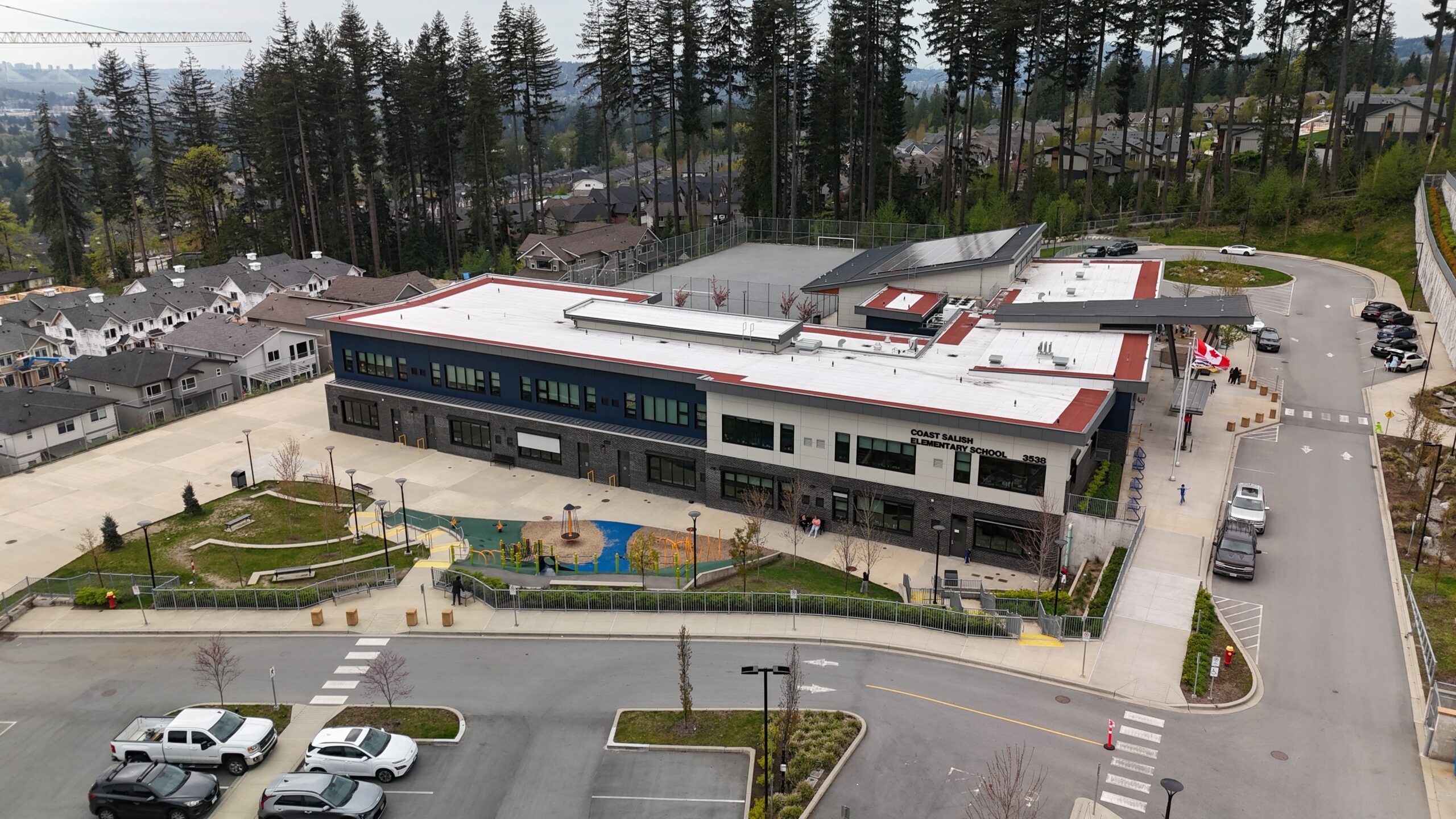 Aerial view of Coast Salish Elementary School on Burke Mountain, Coquitlam — 3538 Sheffield Avenue, opened September 2023